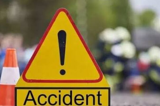 motor-cycle-crashes-divider-on