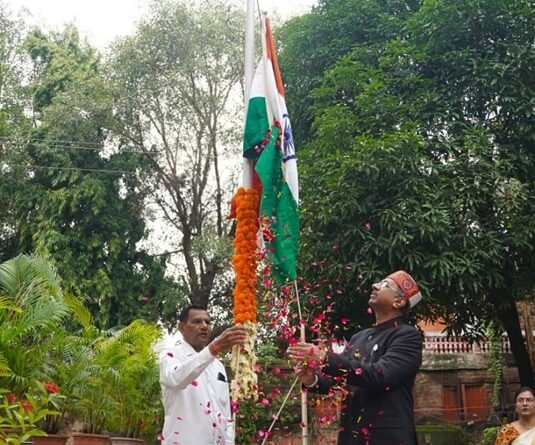 public-relations-commissioner-and-ceo-hoisted-flag