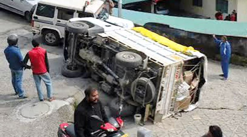 pickup-truck-overturns-near